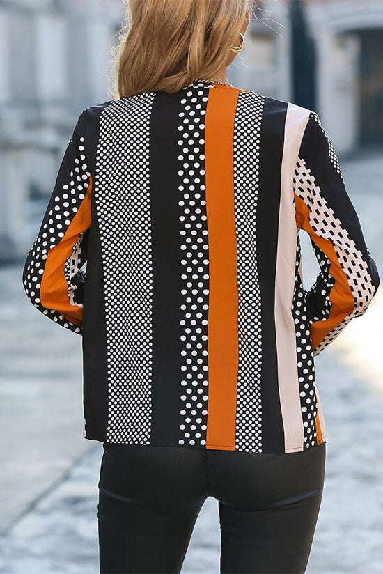 Orange blouse with geometric print and color block notch collar