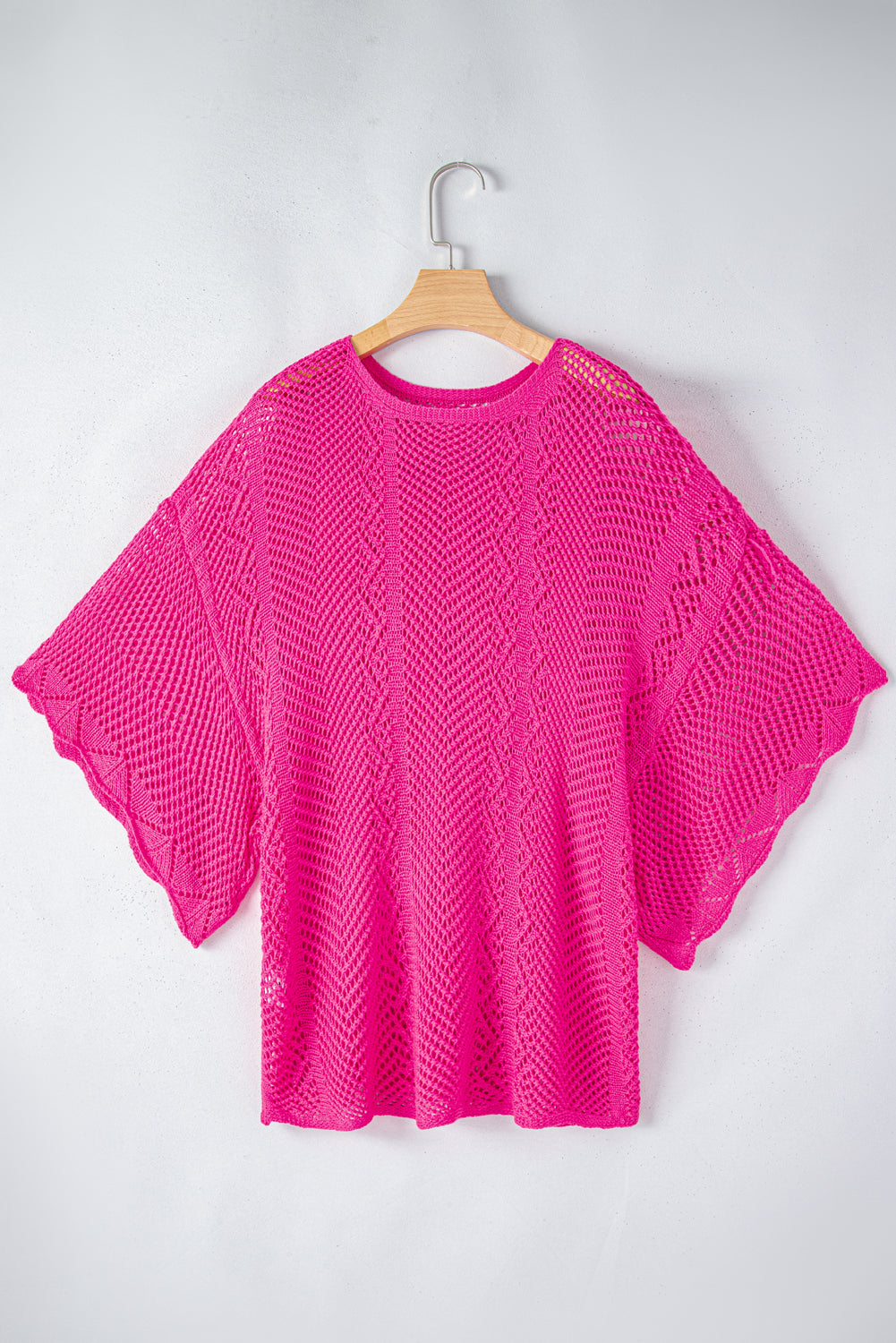 Short -sleeved pink roller -knitting top with scalloped edges