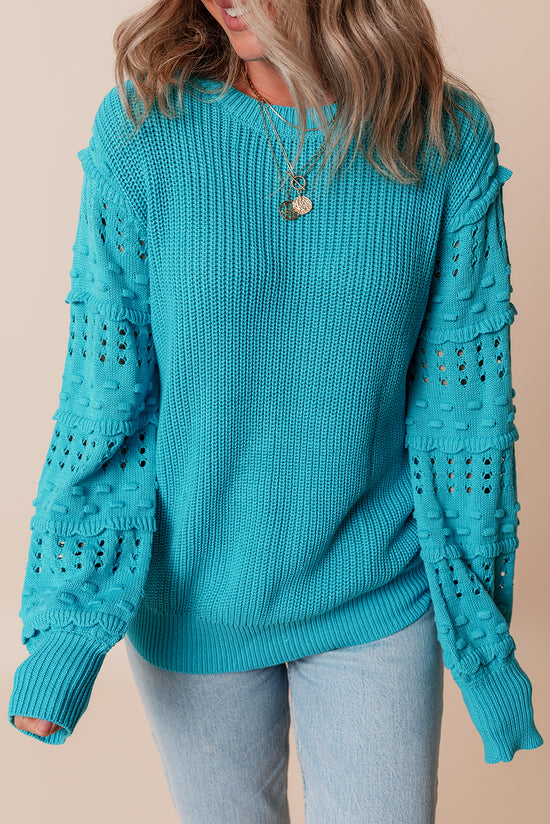 Pull turquoise à manches bulles et œillets à volants