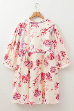 Mini dress with floral print with lace -ups and V -neck with large white balloon sleeves