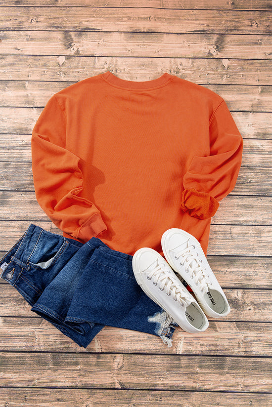 Plain orange crew neck sweatshirt with dropped shoulders