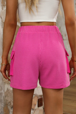 Pantalones cortos grandes con bolsillo de carga rosa brillante