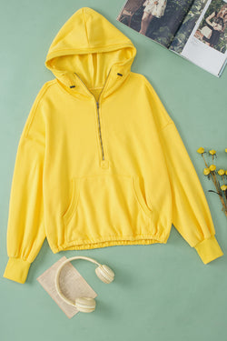 Yellow zip-up hoodie with kangaroo pocket and ribbed trim