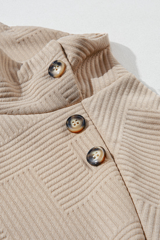 Apricot textured mock neck sweatshirt with asymmetrical buttons