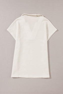 White textured high with short sleeves and V -neck