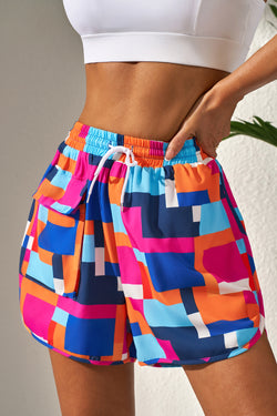 Beach shorts with geometric print *