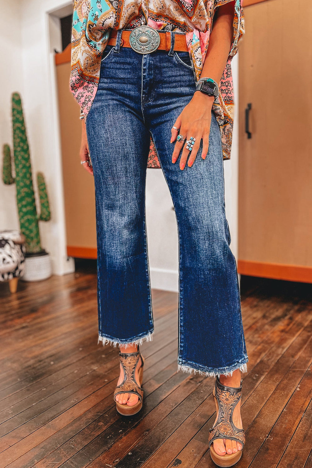 High-waisted flared jeans in sail blue with mineral wash and raw hem