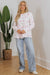 Babydoll pink blouse with floral print and frozen balloon sleeves with lock hole on the back