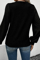 Black ribbed buttoned *