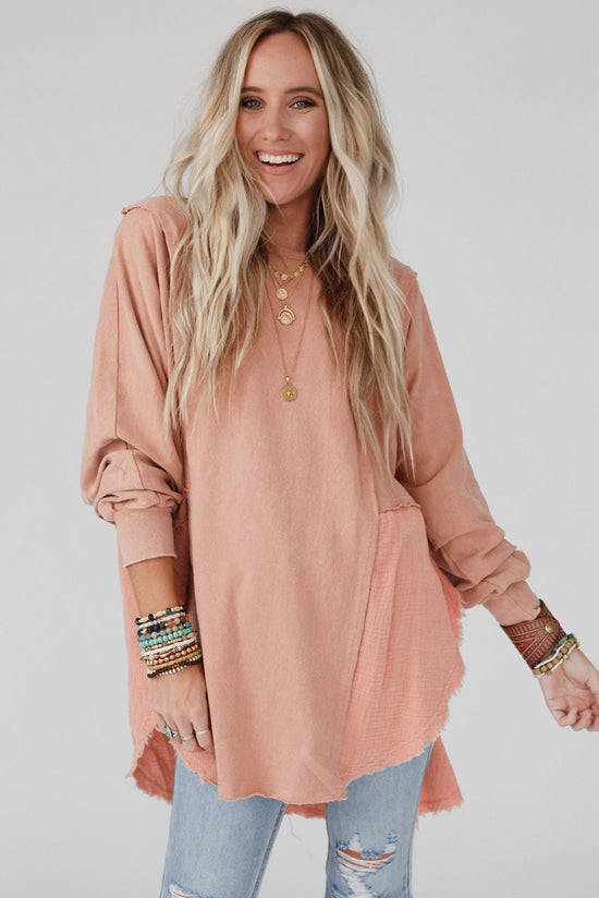 High and low oversized blouse with raw hem and crumpled sparse