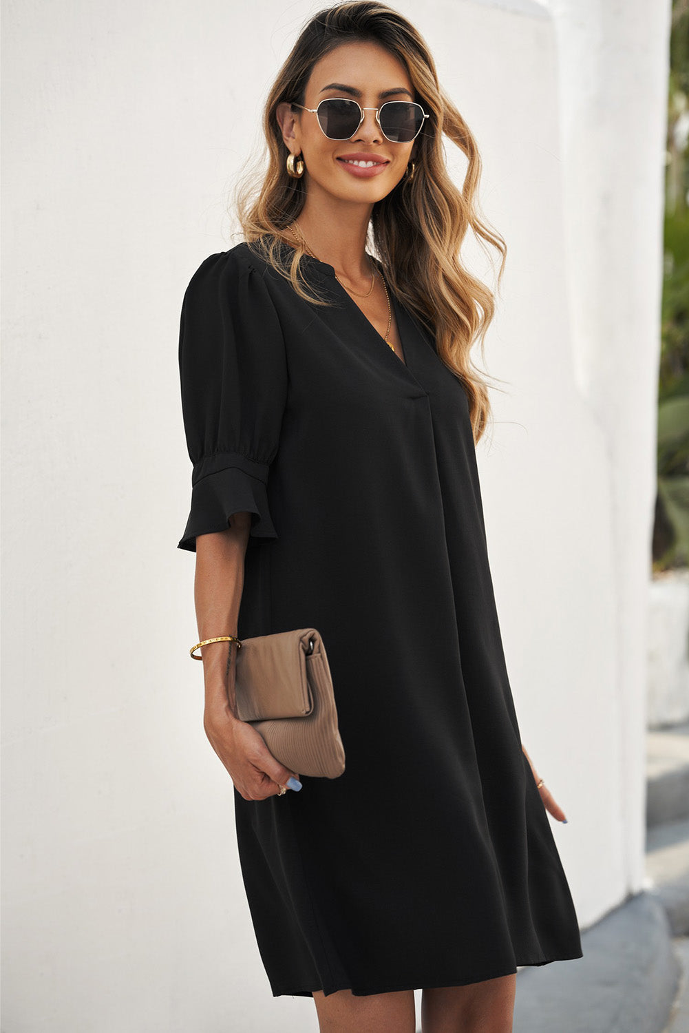 Black straight dress with ruffled sleeves