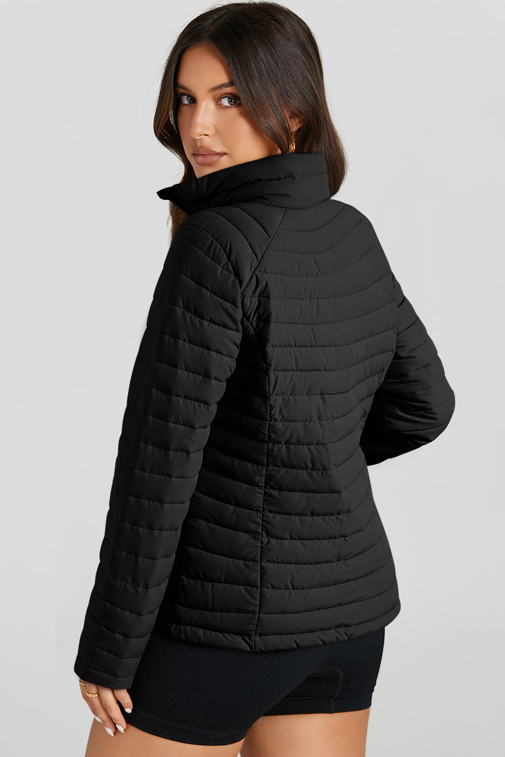 Veste bouffante à zip-up matelassée en couleur noire