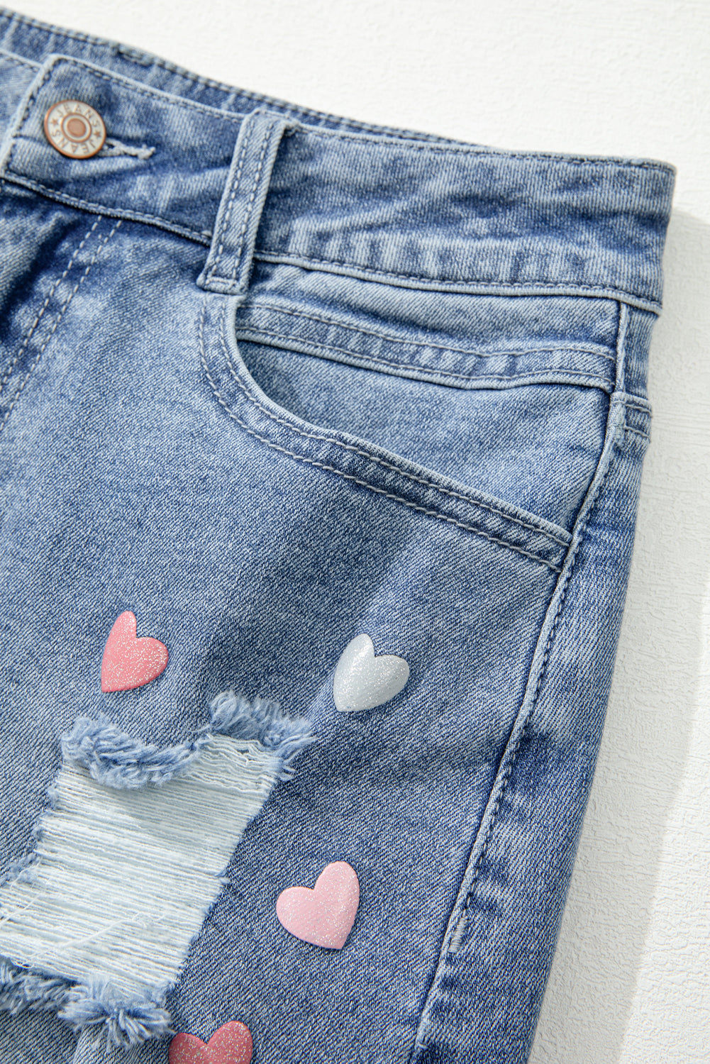 Beau Blue Shimmer Heart Motif Minim Mini jupe de jean en détresse