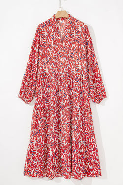 Long -waisted print dress abstract and large red V -neck