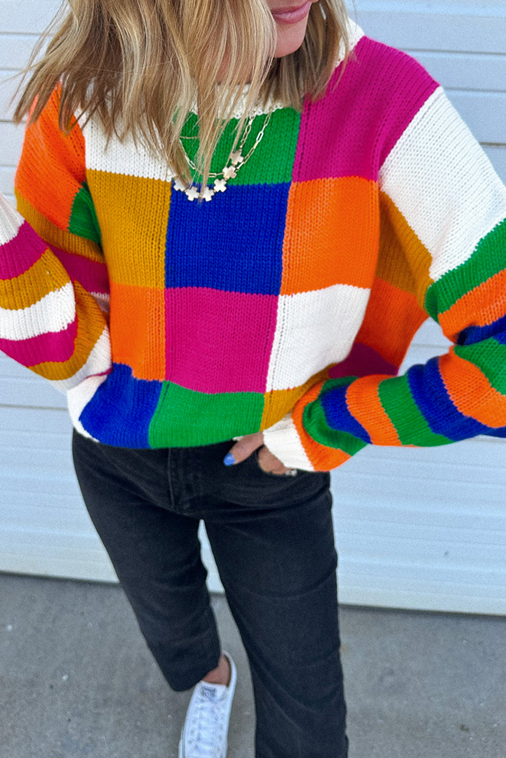 Pull ample à carreaux orange et bloc de couleurs, col rond