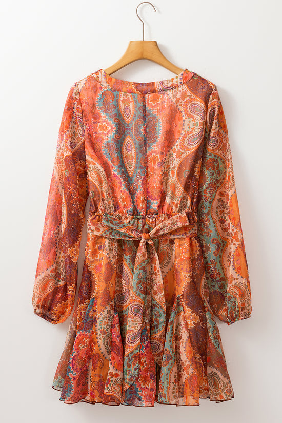 Orange bohemian paisley print mini dress with long sleeves and pleated belt