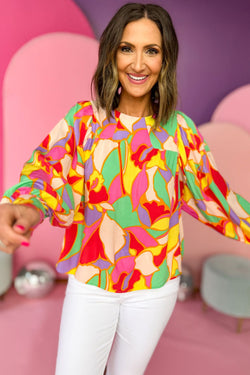 Yellow blouse with puffy sleeves and abstract print