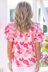 Pink flower high with split neck and puffy sleeves with ruffles