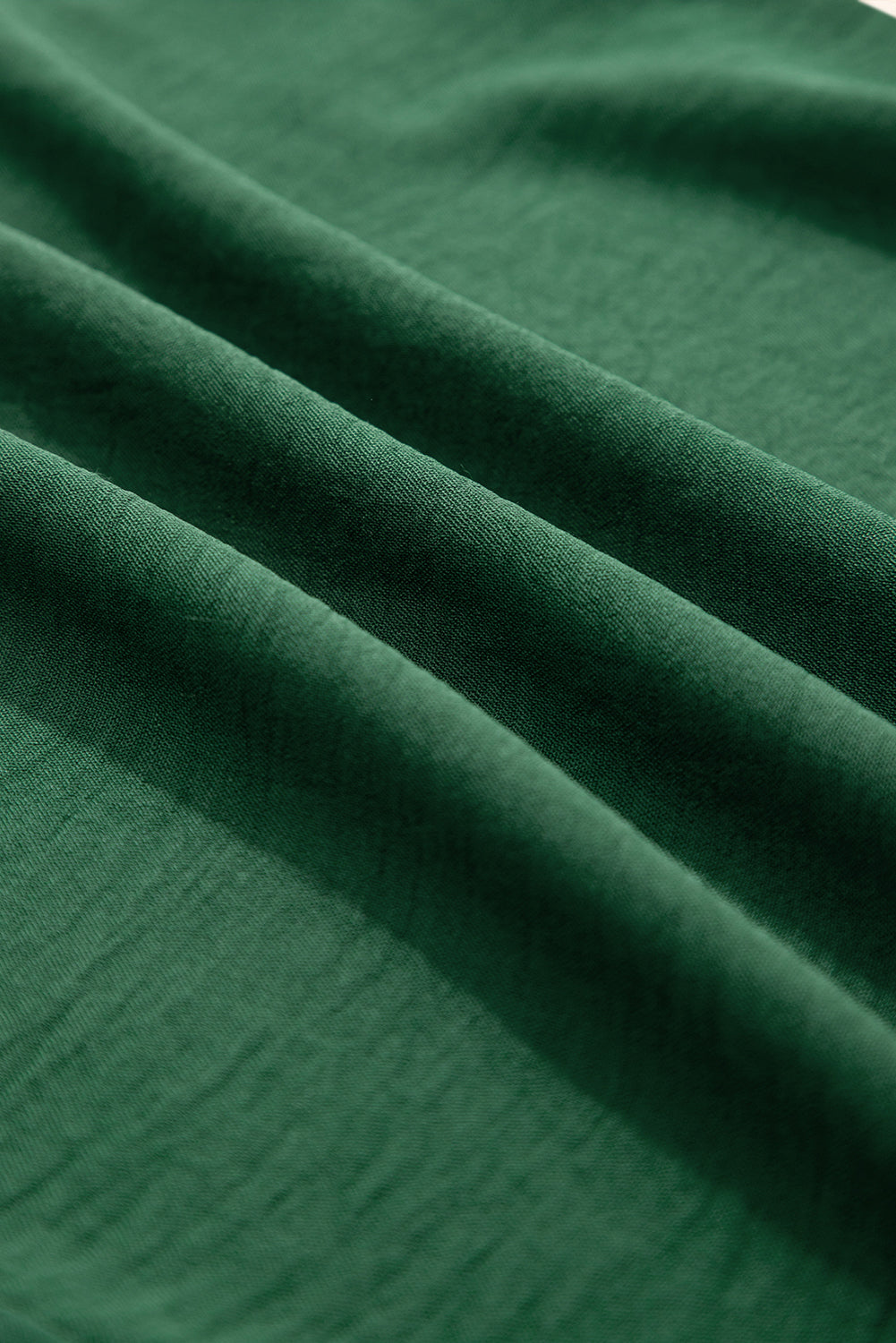 Combinaison verte smockée sans manches à jambe large avec poches