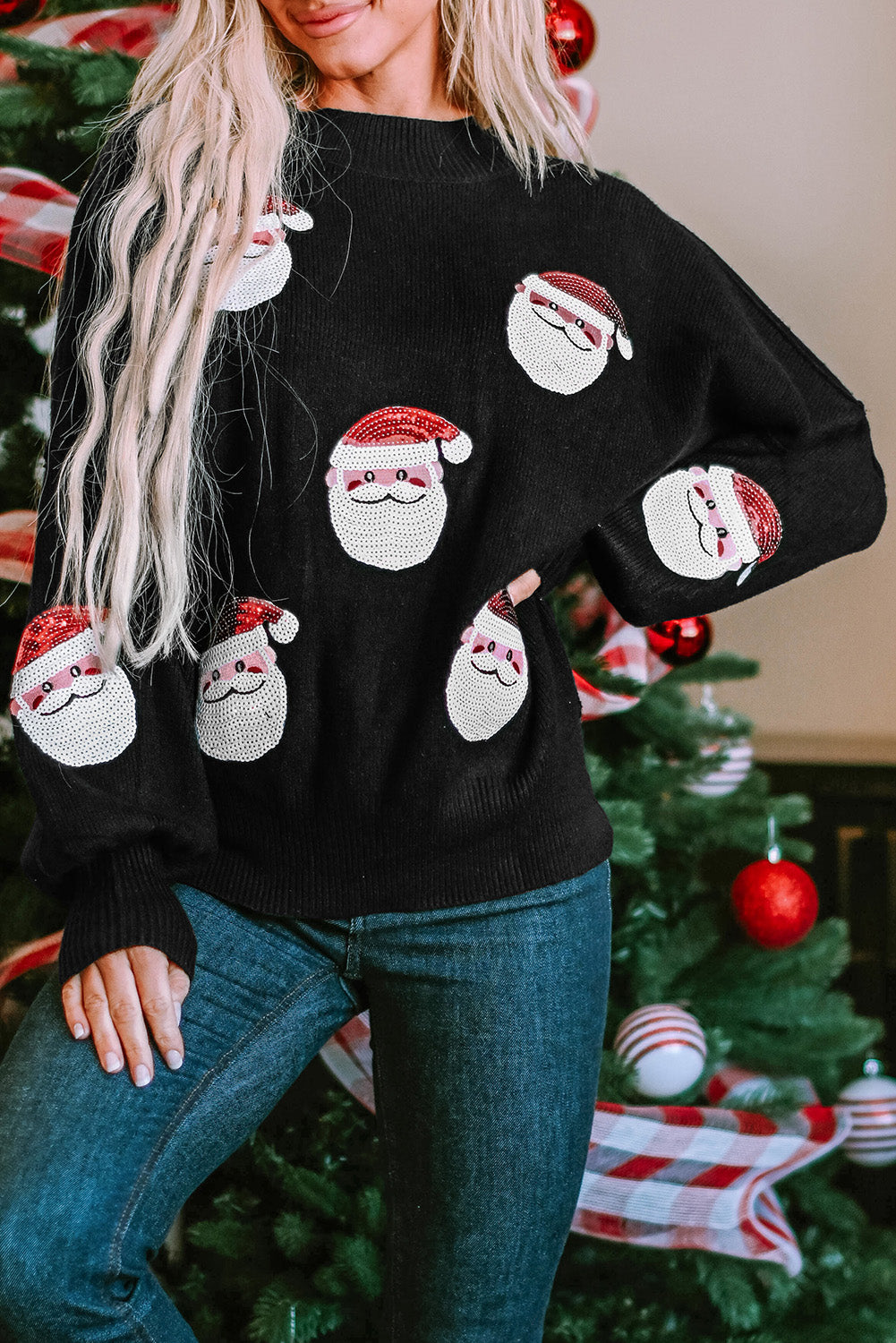 Pull noir à paillettes avec manches évêque du Père Noël