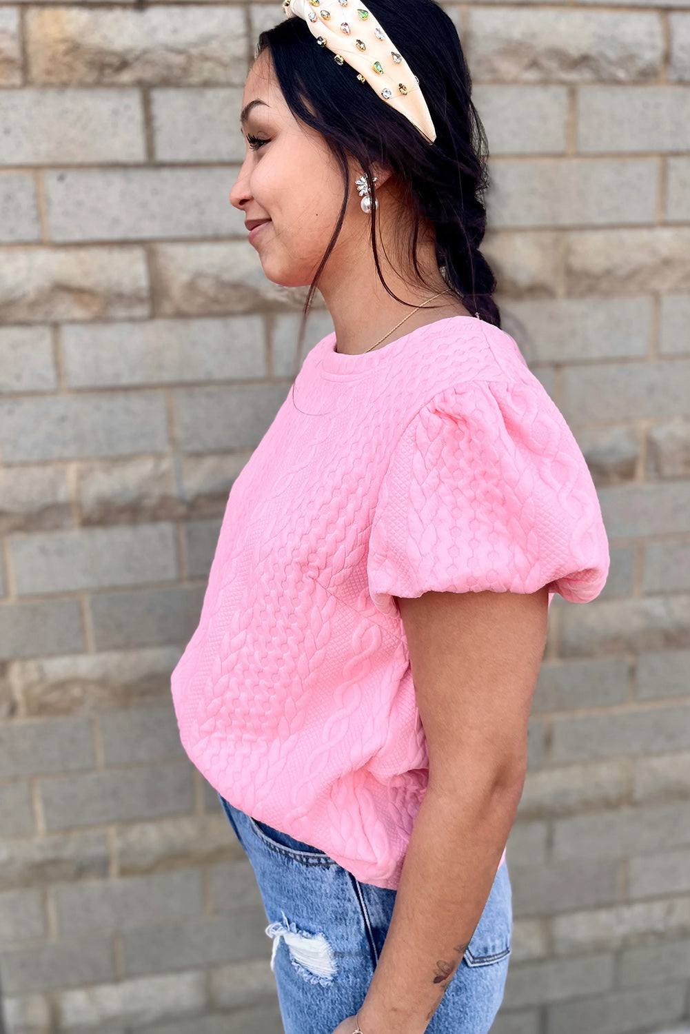 Camiseta rosa texturizada con mangas hinchadas