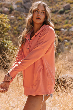 Henley orange hoodie with bat pockets and sleeves