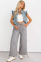 Pantalon ample à rayures et boutons avec poche plaquée