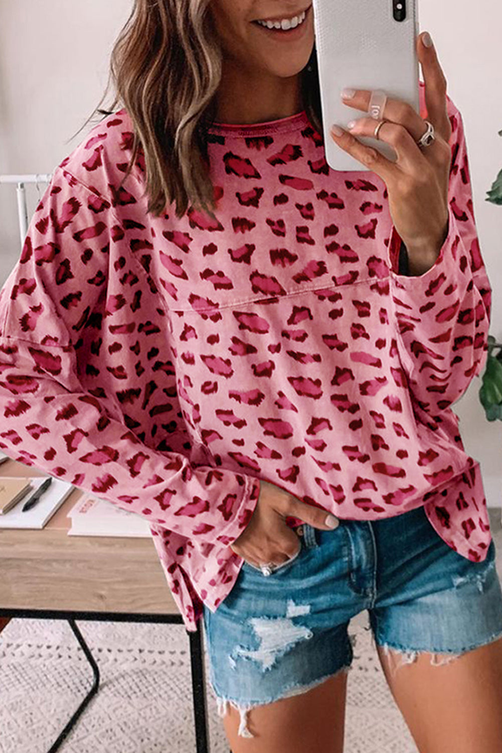 Ample with long sleeves and pink animal print