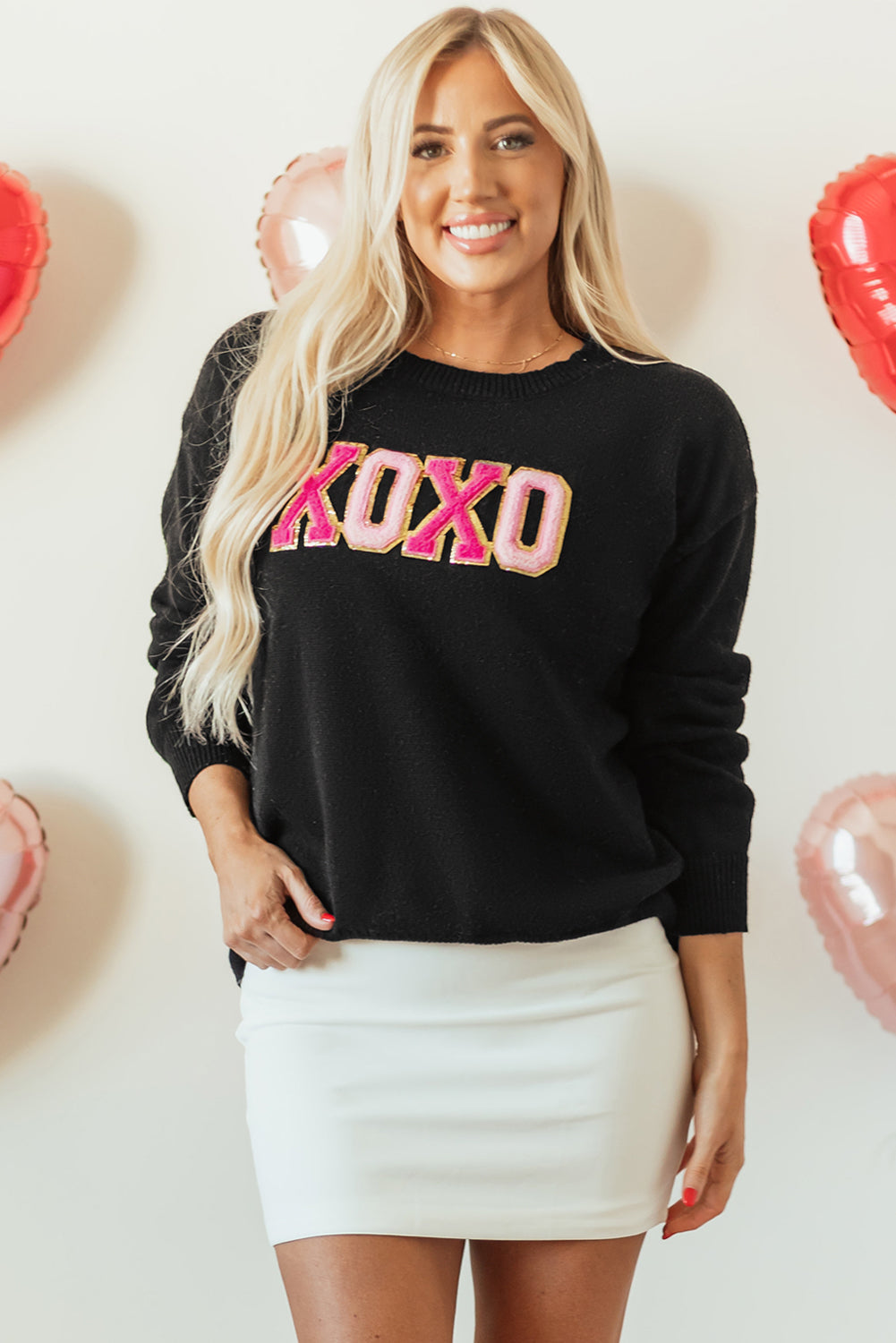 Pull décontracté à col rond imprimé pailleté XOXO noir