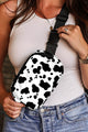 Large belt tilted shoulder bag with printed loop with white cow pattern