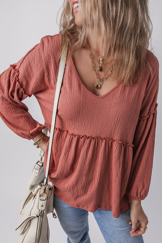 Puffy sleeve blouse and V -collar with tuffled ruffled in a solid mineral red colored