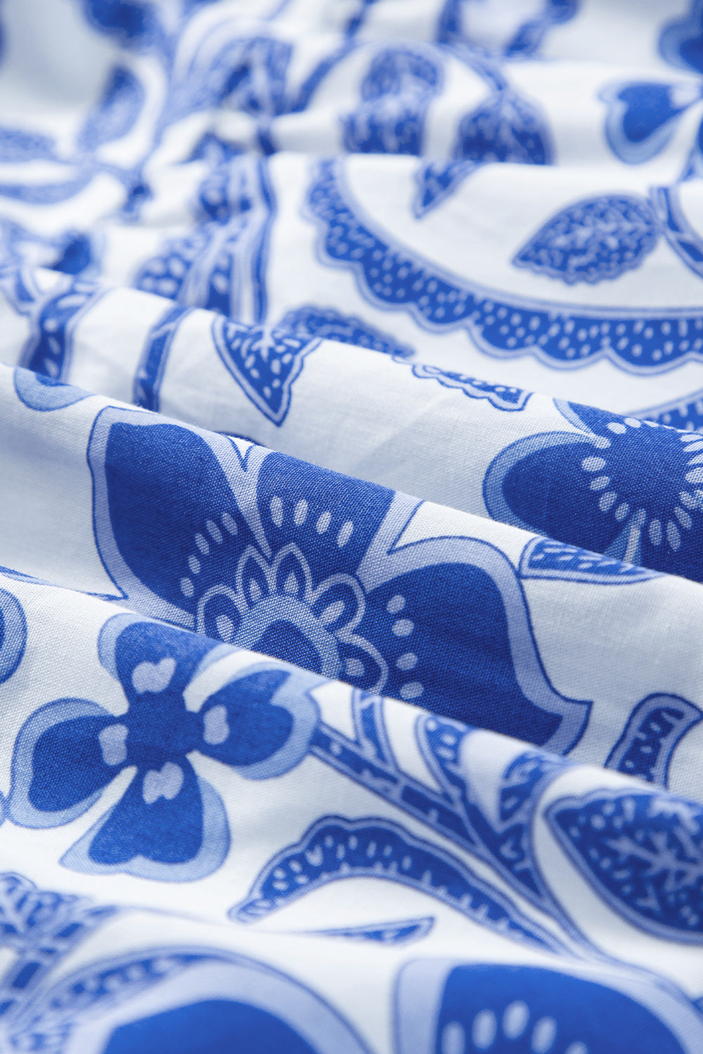 Robe étagée à manches bouffantes et imprimé floral bleu
