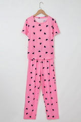 Ensemble de détente rose avec t-shirt et pantalon à imprimé cœur pour la Saint-Valentin-A WOMAN WE LOVE