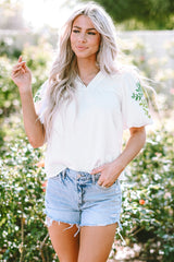 Blouse blanche à col  de fleurs-A WOMAN WE LOVE