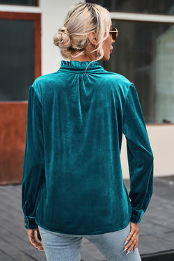 Green velvet top buttoned on the front at the flying neck