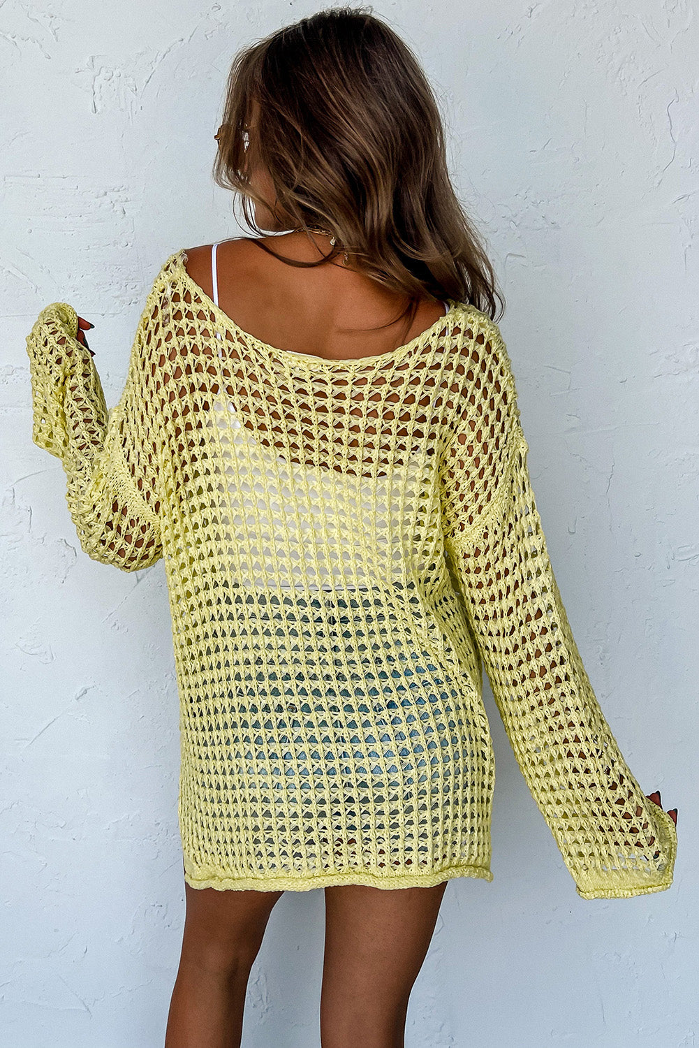 Pull tunique jaune à manches cloche en tricot ouvert au crochet