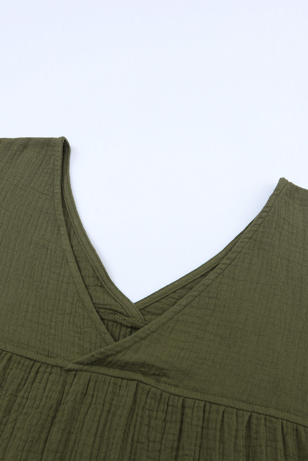 Grüne strukturierte V -Nackenarmband -Hülle Babydoll Bluse