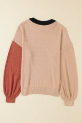 Black sweater with ribbed edge and COLOR BLOCK bishop sleeves
