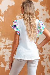 White textured high with puffy sleeves