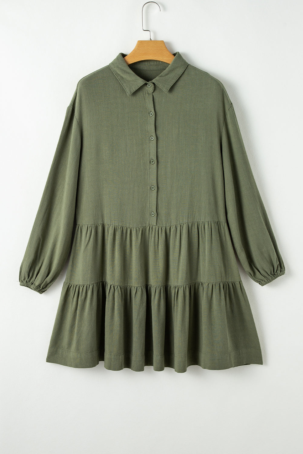 Mini-Robe folded shirt buttoned with puffy sleeves and several jungle green levels