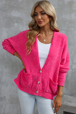 Cardigan pull avec poches sur le devant et boutons roses