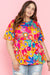 Chemisier babydoll rose à manches courtes et imprimé floral grande taille-A WOMAN WE LOVE