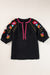 Black textured blouse with puffy sleeves and Ricrac floral embroidery