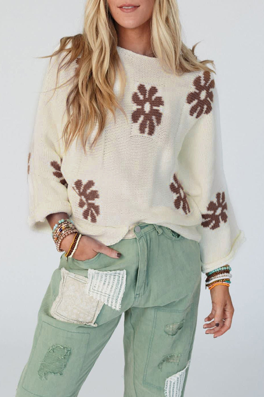 White round-neck sweater with color block floral pattern