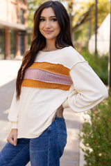 White top with drooping sleeve in patchwork knit *