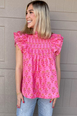 Flying blouse with ruffles and floating sleeves with red pink floral print