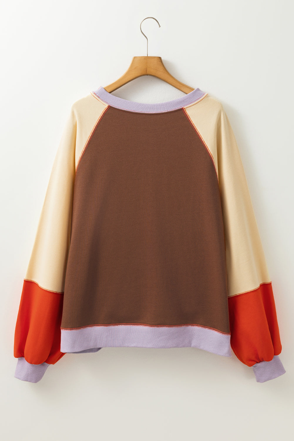 Orangefarbene Farbblockseite schlägt Raglan -Ärmel lous Fit Top