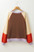 Orange raglan sleeve loose top with side slits and color blocking