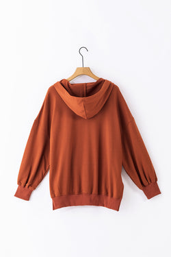 Oversized chestnut V-neck hoodie with kangaroo pocket