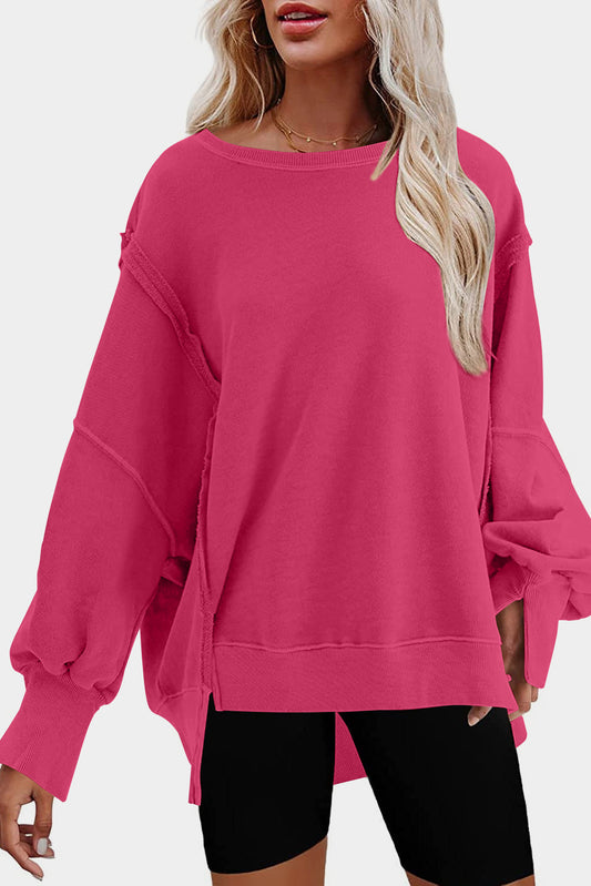 Sudadera de dobladillo alto de costura de costura expuesta a rosa